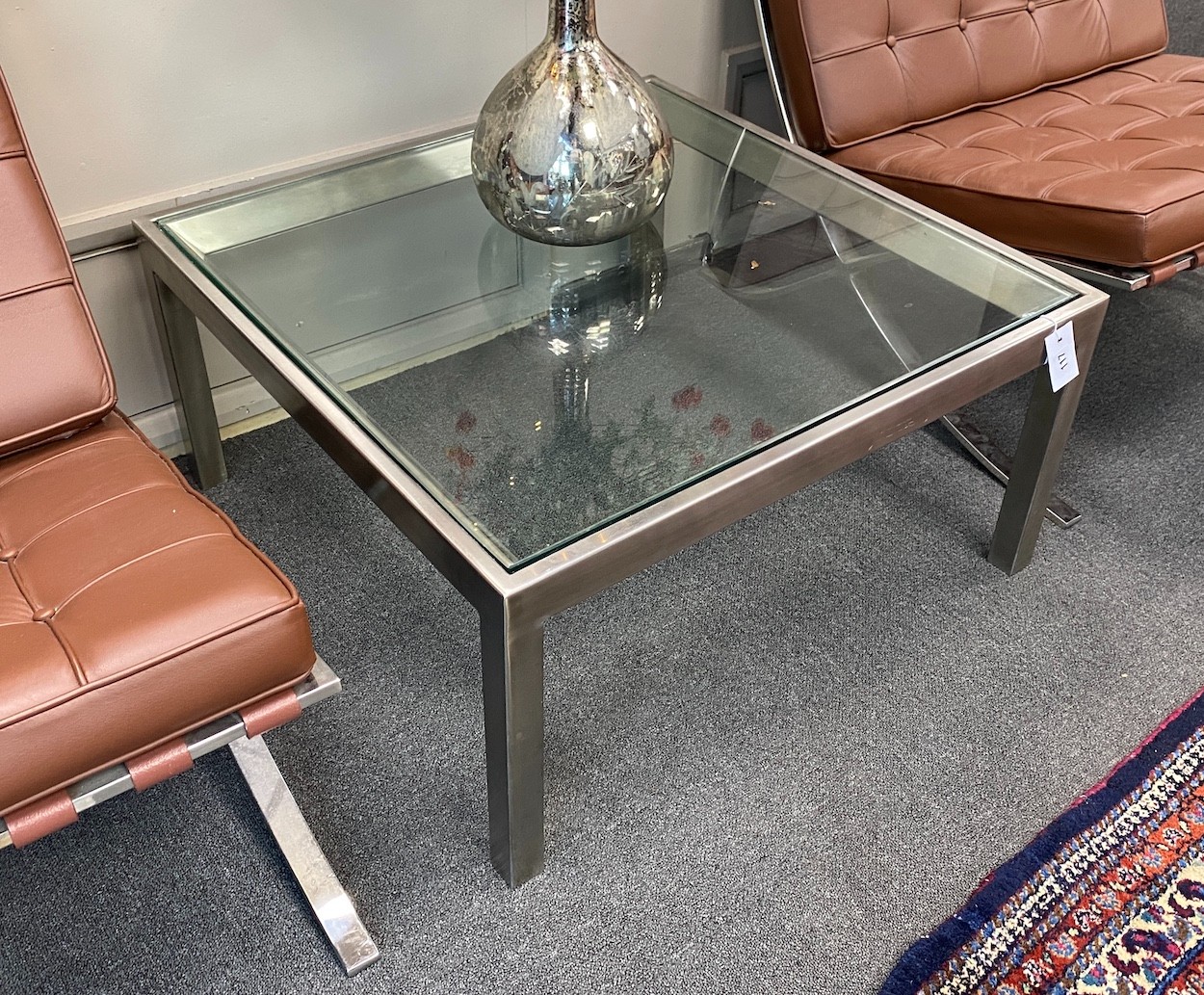 A contemporary square glass top coffee table, width 76cm, height 38cm